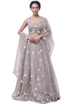 Shop beige embroidered organza lehenga online in USA with dupatta. Dazzle on weddings and special occasions with exquisite designer lehengas, Anarkali suit, sharara suit, Indowestern outfits, bridal lehengas from Pure Elegance Indian clothing store in the USA. -full view