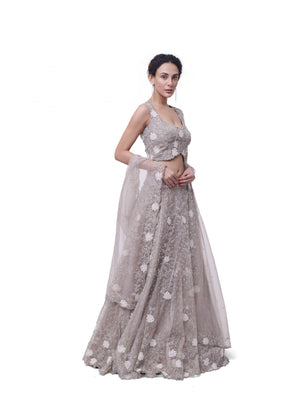 Shop beige embroidered organza lehenga online in USA with dupatta. Dazzle on weddings and special occasions with exquisite designer lehengas, Anarkali suit, sharara suit, Indowestern outfits, bridal lehengas from Pure Elegance Indian clothing store in the USA. -lehenga