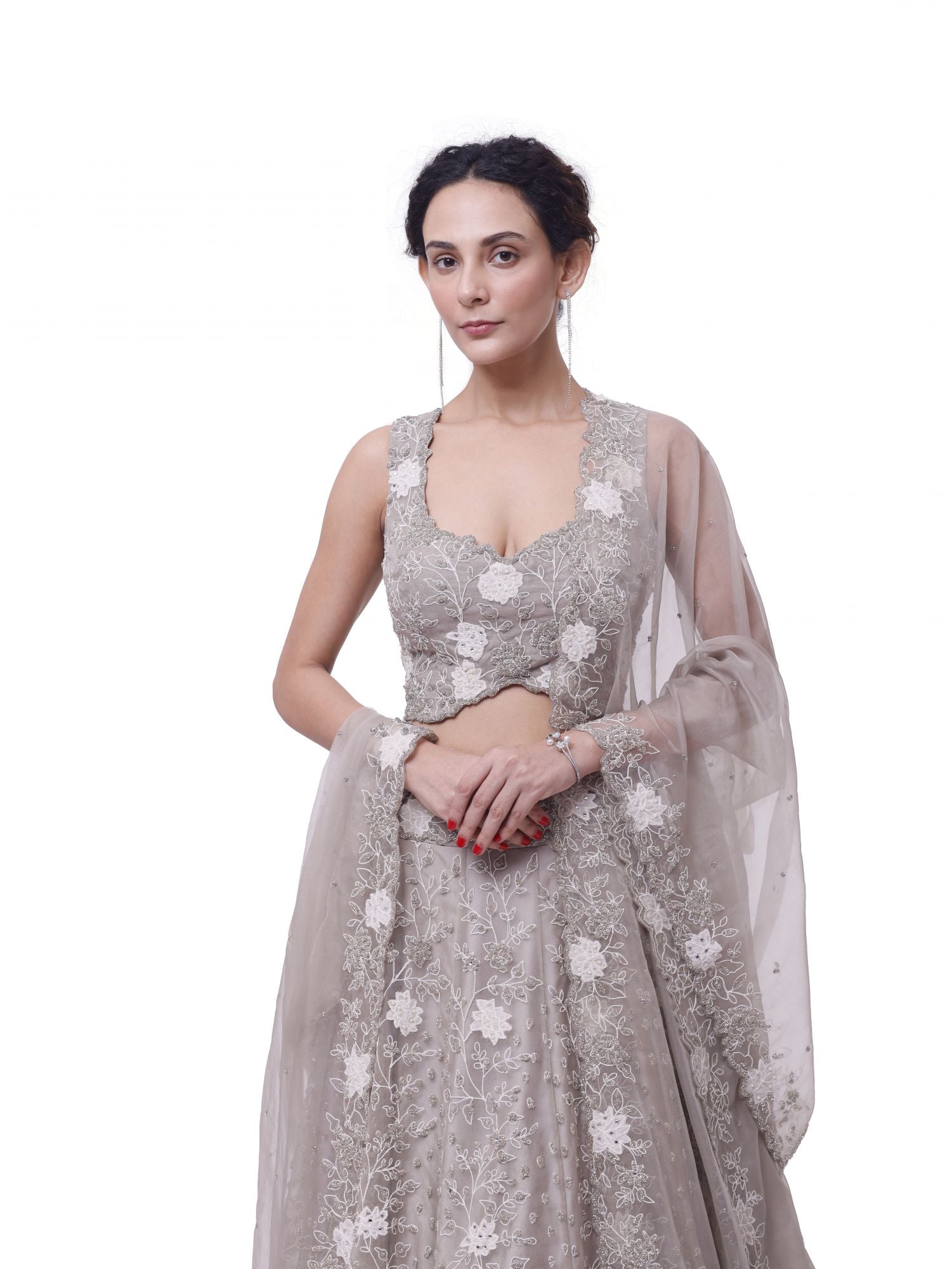 Shop beige embroidered organza lehenga online in USA with dupatta. Dazzle on weddings and special occasions with exquisite designer lehengas, Anarkali suit, sharara suit, Indowestern outfits, bridal lehengas from Pure Elegance Indian clothing store in the USA. -closeup