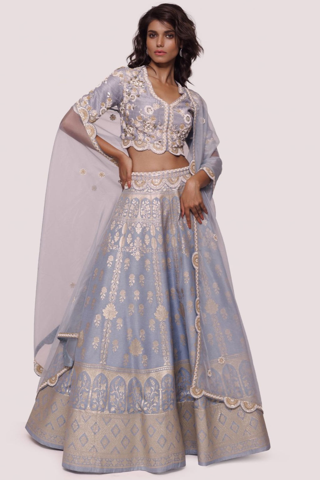 Buy powder blue hand embroidered silk lehenga online in USA with dupatta. Dazzle on weddings and special occasions with exquisite designer lehengas, Anarkali suit, sharara suit, Indowestern outfits, bridal lehengas from Pure Elegance Indian clothing store in the USA. -full view