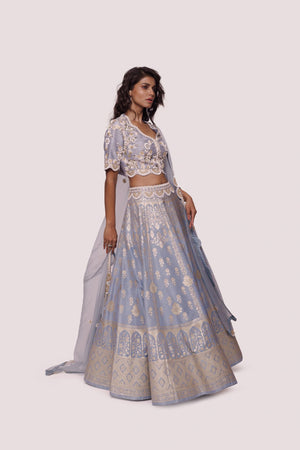 Buy powder blue hand embroidered silk lehenga online in USA with dupatta. Dazzle on weddings and special occasions with exquisite designer lehengas, Anarkali suit, sharara suit, Indowestern outfits, bridal lehengas from Pure Elegance Indian clothing store in the USA. -side
