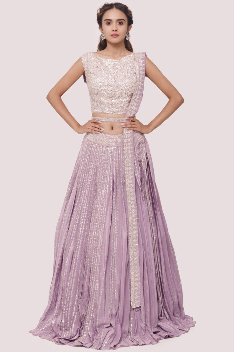 Shop beautiful lavender embroidered crepe lehenga online in USA with belt. Dazzle on weddings and special occasions with exquisite designer lehengas, Anarkali suit, sharara suit, Indowestern outfits, bridal lehengas from Pure Elegance Indian clothing store in the USA. -full view