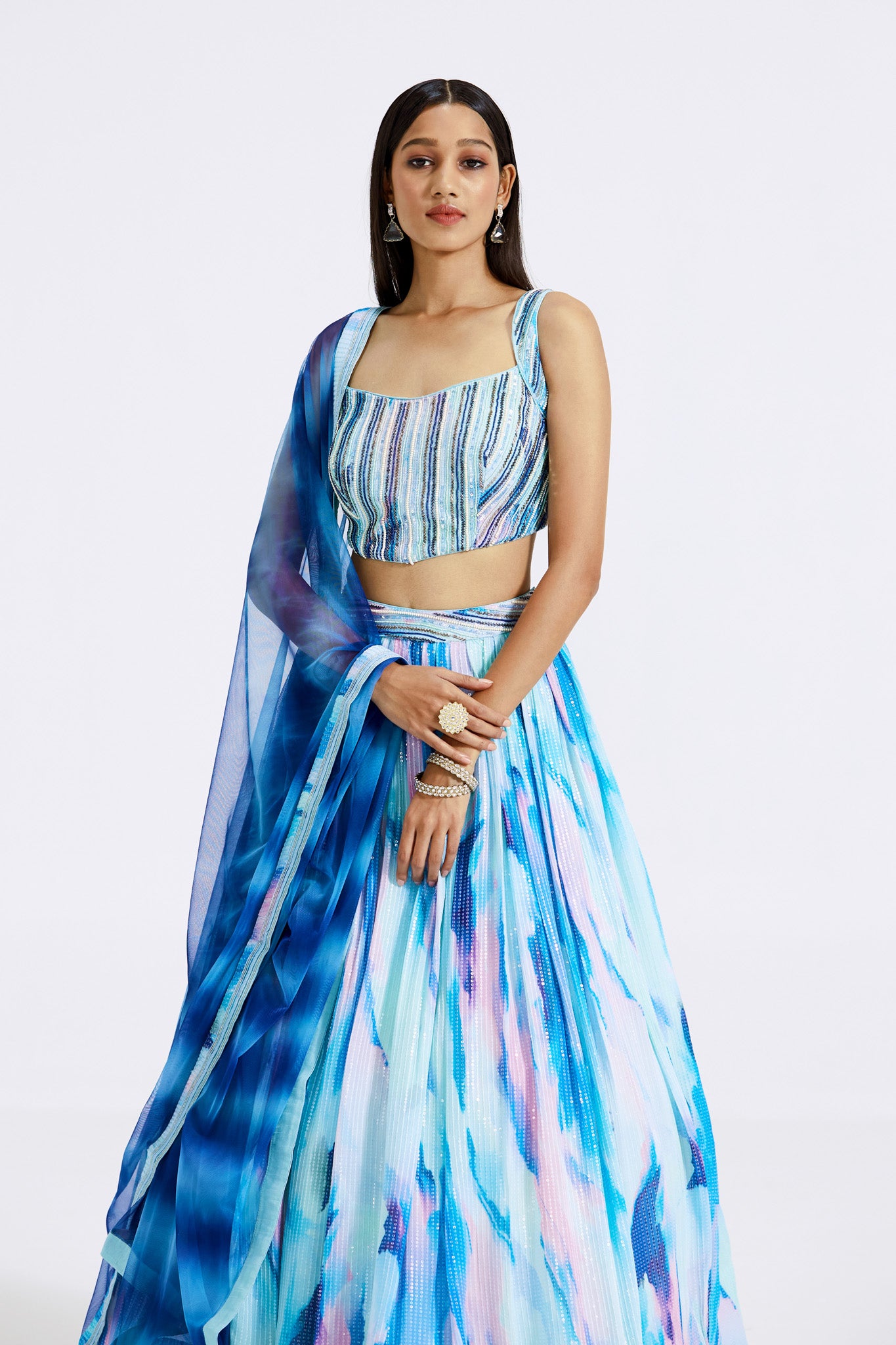 Buy aqua blue printed embellished georgette lehenga online in USA with dupatta. Shop the best and latest designs in embroidered sarees, designer sarees, Anarkali suit, lehengas, sharara suits for weddings and special occasions from Pure Elegance Indian fashion store in USA.-closeup