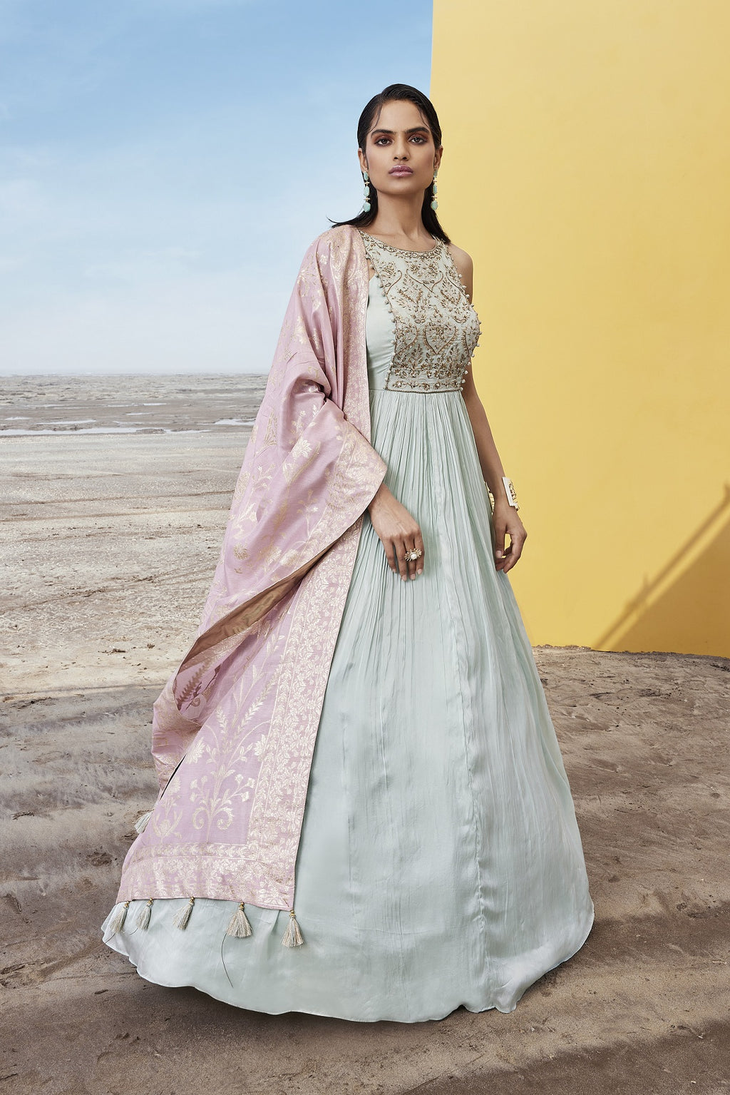Buy pastel green embroidered Anarkali suit online in USA with pink dupatta. Be the star of the occasions in designer lehengas, embroidered suits, Anarkali dress, designer gowns, sharara suits, Bollywood sarIs from Pure Elegance Indian fashion store in USA.-full view