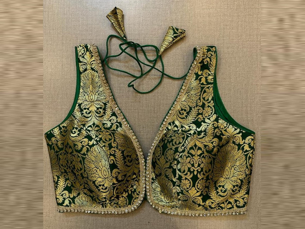 Buy green Banarasi sleeveless saree blouse online in USA with stone lace. Elevate your saree style with exquisite readymade sari blouses, embroidered saree blouses, Banarasi sari blouse, designer saree blouse, choli-cut blouses, corset blouses from Pure Elegance Indian fashion store in USA.-full view