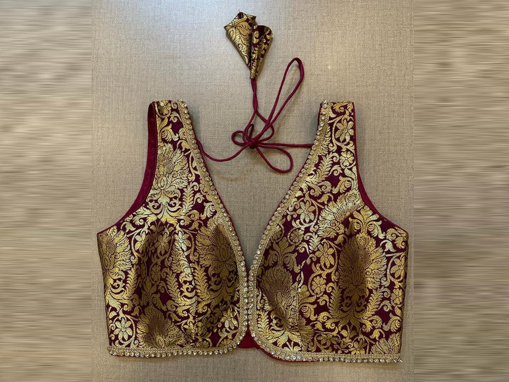 Shop wine color Banarasi sleeveless saree blouse online in USA with stone lace. Elevate your saree style with exquisite readymade sari blouses, embroidered saree blouses, Banarasi sari blouse, designer saree blouse, choli-cut blouses, corset blouses from Pure Elegance Indian fashion store in USA.-full view