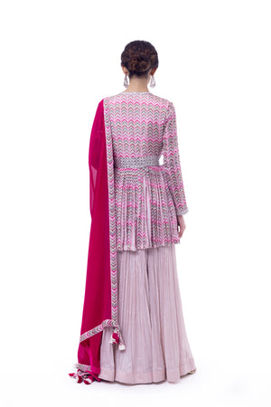 Shop pink printed chiffon peplum sharara suit online in USA with rani dupatta. Shop the best and latest designs in embroidered sarees, designer sarees, Anarkali suit, lehengas, sharara suits for weddings and special occasions from Pure Elegance Indian fashion store in USA.-back
