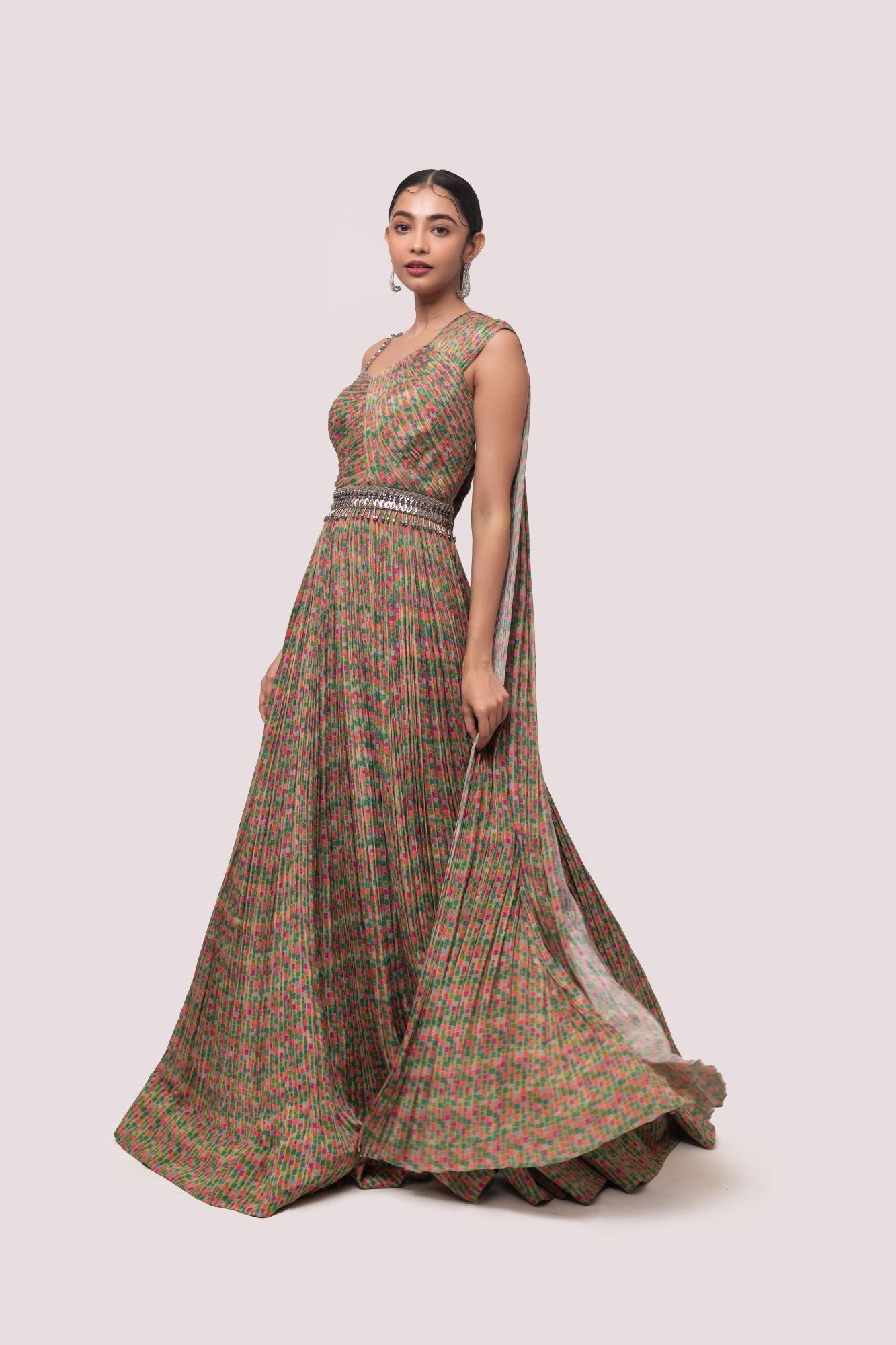 Shop stunning multicolored pleated chiffon gown online in USA. Shop the best and latest designs in embroidered sarees, designer sarees, Anarkali suit, lehengas, sharara suits for weddings and special occasions from Pure Elegance Indian fashion store in USA.-gown