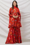 Buy a red Floral silk sharara suit set featuring Kurta with bead & cut dana work, V-neck, paired with sharara bottom and net dupatta. Dazzle on weddings and special occasions with exquisite Indian designer dresses, sharara suits, Anarkali suits, and wedding lehengas from Pure Elegance Indian fashion store in the USA.