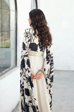 Buy black & white crepe jumpsuit adorned with hand-embroidered sequins. Dazzle on weddings and special occasions with exquisite Indian designer dresses, sharara suits, Anarkali suits, and wedding lehengas from Pure Elegance Indian fashion store in the USA.