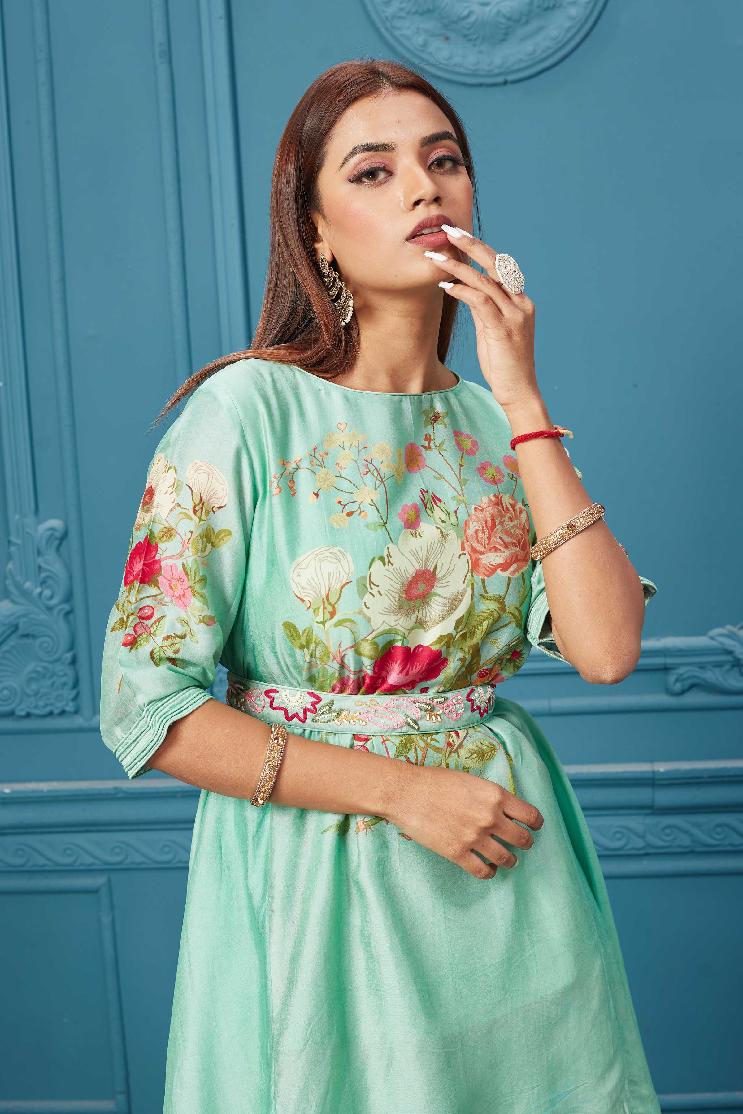 Shop Gorgeous neon green suit featuring a boat neck, quarter sleeves, and a stylish belt. Shop Indian dresses, gowns, Anarkali, lehenga, and saree online at Pure Elegance or visit our store in the USA.
