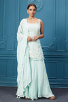 Shop light Blue embroidered sleeveless short kurta, plazzo, and beautiful tassel embroidered dupatta. Dazzle on special occasions with exquisite Indian designer dresses, sharara suits, Anarkali suits, bridal lehengas, and sharara suits from Pure Elegance Indian clothing store in the USA. Shop online from Pure Elegance.