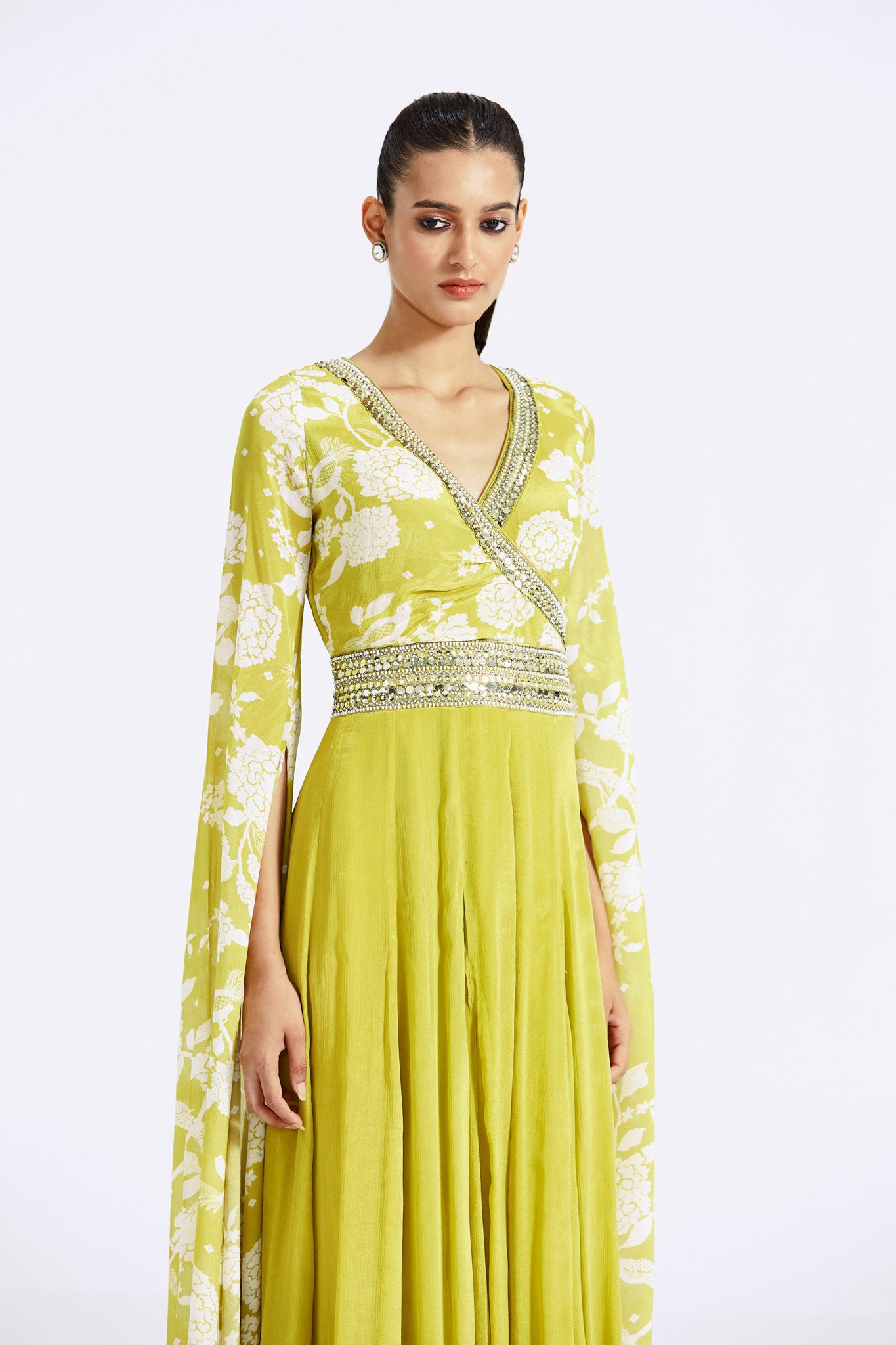 Shop beautiful lime green printed chinon jumpsuit online in USA with cape sleeves. Shop the best and latest designs in embroidered sarees, designer sarees, Anarkali suit, lehengas, sharara suits for weddings and special occasions from Pure Elegance Indian fashion store in USA.-closeup