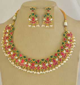 Shop Amrapali pink and green stone necklace set online in USA with pearls. Buy beautiful gold plated jewelry, gold plated earrings, silver earrings, silver bangles, bridal jewelry, wedding jewellery from Pure Elegance Indian fashion store in USA.-full view