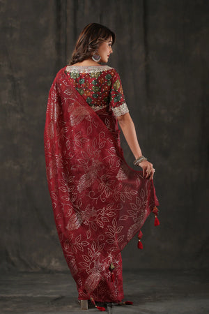 Shop beautiful maroon embellished organza silk saree online in USA. Look royal on special occasions in exquisite designer sarees, pure silk sarees, handloom sarees, Bollywood sarees, embroidered sarees, Banarasi sarees, organza sarees from Pure Elegance Indian saree store in USA.-back