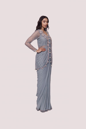 Shop doctor blue lycra drape saree online in USA with embellished jacket. Look your best at parties and weddings in beautiful designer sarees, embroidered sarees, handwoven sarees, silk sarees, organza saris from Pure Elegance Indian saree store in USA.-side