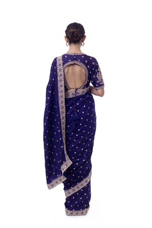 Buy purple heavy embroidered Banarasi silk saree online in USA with saree blouse. Look your best at parties and weddings in beautiful designer sarees, embroidered sarees, handwoven sarees, silk sarees, organza saris from Pure Elegance Indian saree store in USA.-back