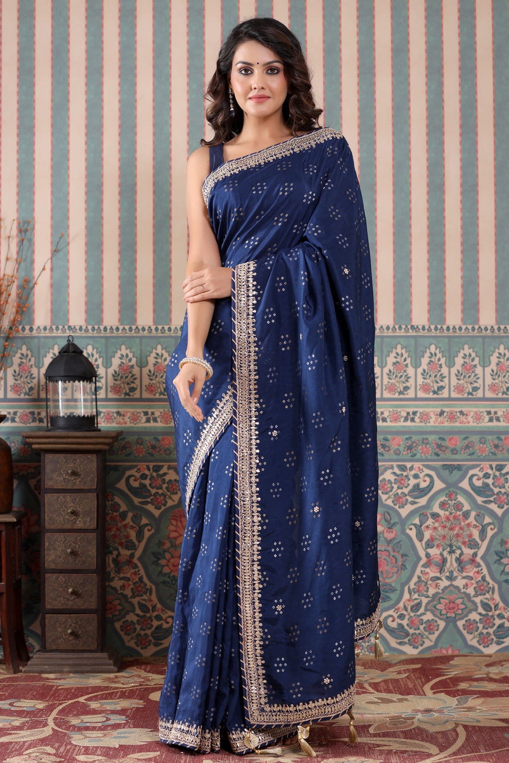 Buy beautiful navy blue georgette saree online in USA with embroidered border. Make a fashion statement at weddings with stunning designer sarees, embroidered sarees with blouse, wedding sarees, handloom sarees from Pure Elegance Indian fashion store in USA.-full view