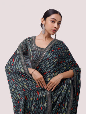 Buy green printed and embroidered satin saree online in USA with saree blouse. Look your best at parties and weddings in beautiful designer sarees, embroidered sarees, handwoven sarees, silk sarees, organza saris from Pure Elegance Indian saree store in USA.-closeup