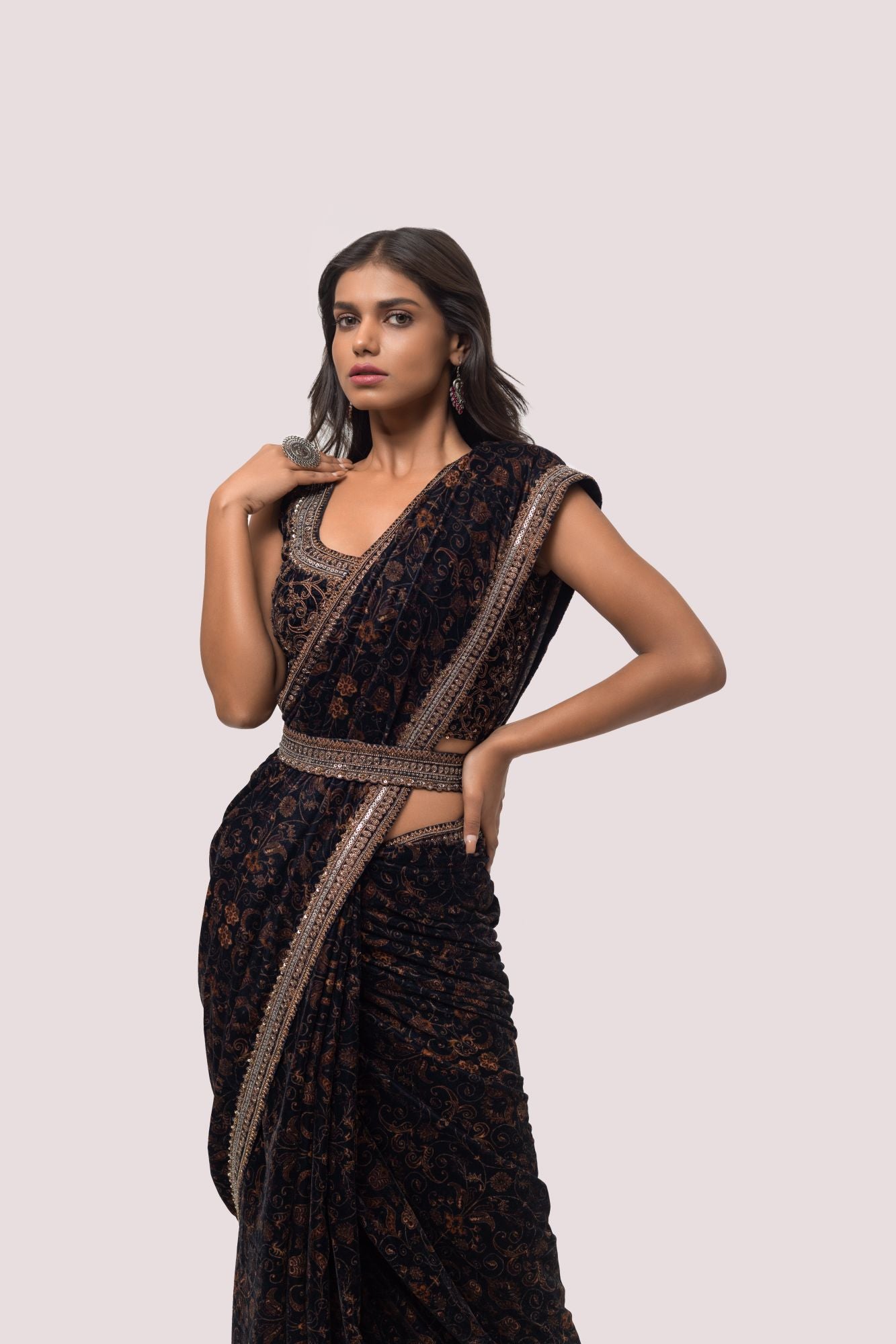 Shop a Beautiful Black saree featuring yellow printed Kalamkari work embellishments. It comes with an embroidered sleeves blouse. Make a fashion statement on festive occasions and weddings with designer sarees, designer suits, Indian dresses, Anarkali suits, palazzo suits, designer gowns, sharara suits, and embroidered sarees from Pure Elegance Indian fashion store in the USA.