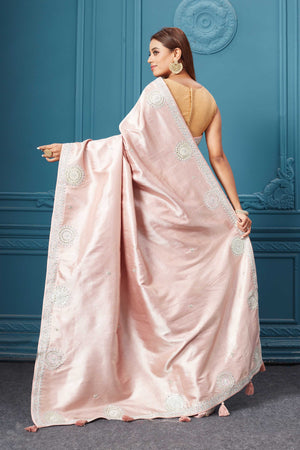 Shop powder pink embroidered Kanjeevaram silk saree online in USA. Look royal at weddings and festive occasions in exquisite designer sarees, handwoven sarees, pure silk saris, Banarasi sarees, Kanchipuram silk sarees from Pure Elegance Indian saree store in USA. -back