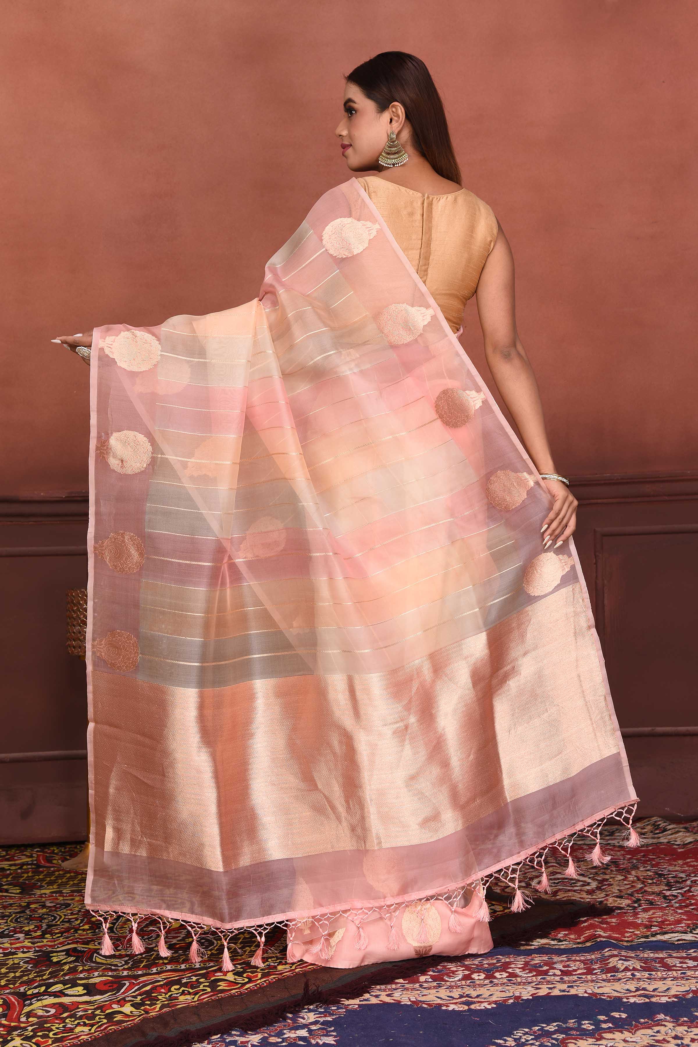 Shop pink zari stripes organza Banarasi saree online in USA with zari buta. Look your best on festive occasions in latest designer sarees, pure silk sarees, Kanchipuram silk sarees, handwoven sarees, tussar silk sarees, embroidered sarees from Pure Elegance Indian clothing store in USA.-back