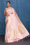 Buy powder pink Katan silk Banarasi saree online in USA with zari stripes. Look your best on festive occasions in latest designer sarees, pure silk saris, Kanchipuram silk sarees, handwoven sarees, tussar silk sarees, embroidered saris from Pure Elegance Indian clothing store in USA.-full view