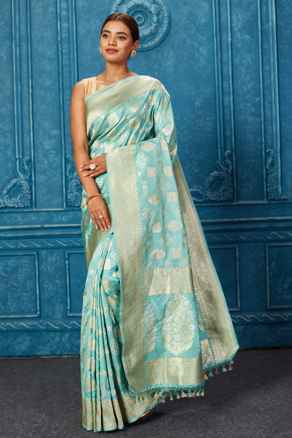 Buy pastel green Banarasi saree online in USA with zari buta and border. Look your best on festive occasions in latest designer sarees, pure silk saris, Kanchipuram silk sarees, handwoven sarees, tussar silk sarees, embroidered sarees from Pure Elegance Indian saree store in USA.-full view