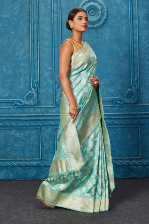 Buy pastel green Banarasi saree online in USA with zari buta and border. Look your best on festive occasions in latest designer sarees, pure silk saris, Kanchipuram silk sarees, handwoven sarees, tussar silk sarees, embroidered sarees from Pure Elegance Indian saree store in USA.-side