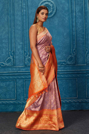 Shop lavender Banarasi saree online in USA with zari minakari work. Look your best on festive occasions in latest designer sarees, pure silk saris, Kanchipuram silk sarees, handwoven sarees, tussar silk sarees, embroidered sarees from Pure Elegance Indian saree store in USA.-side