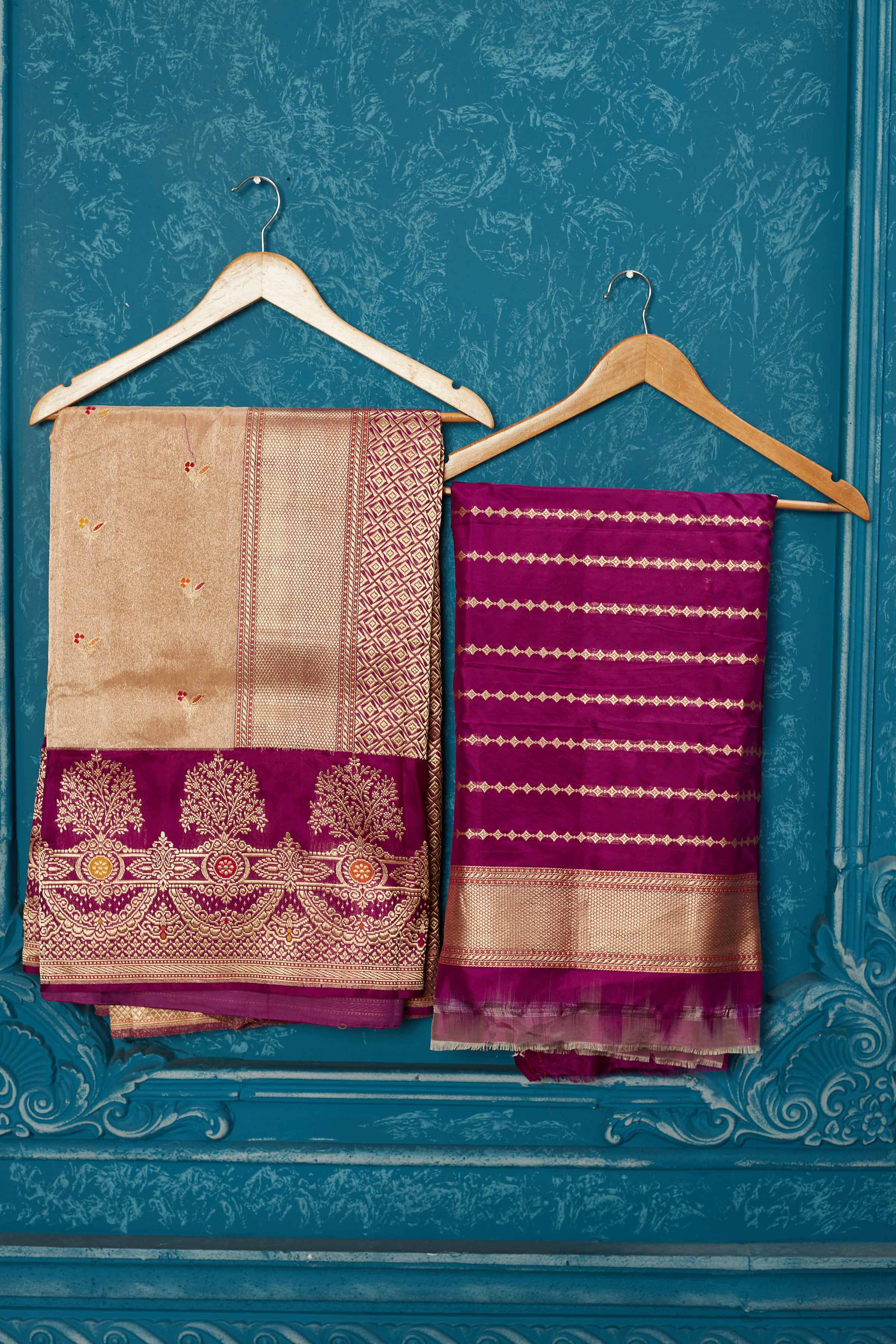 Shop creamish golden Banarasi saree online in USA with purple zari border. Look your best on festive occasions in latest designer sarees, pure silk saris, Kanchipuram silk sarees, handwoven sarees, tussar silk sarees, embroidered sarees from Pure Elegance Indian saree store in USA.-blouse