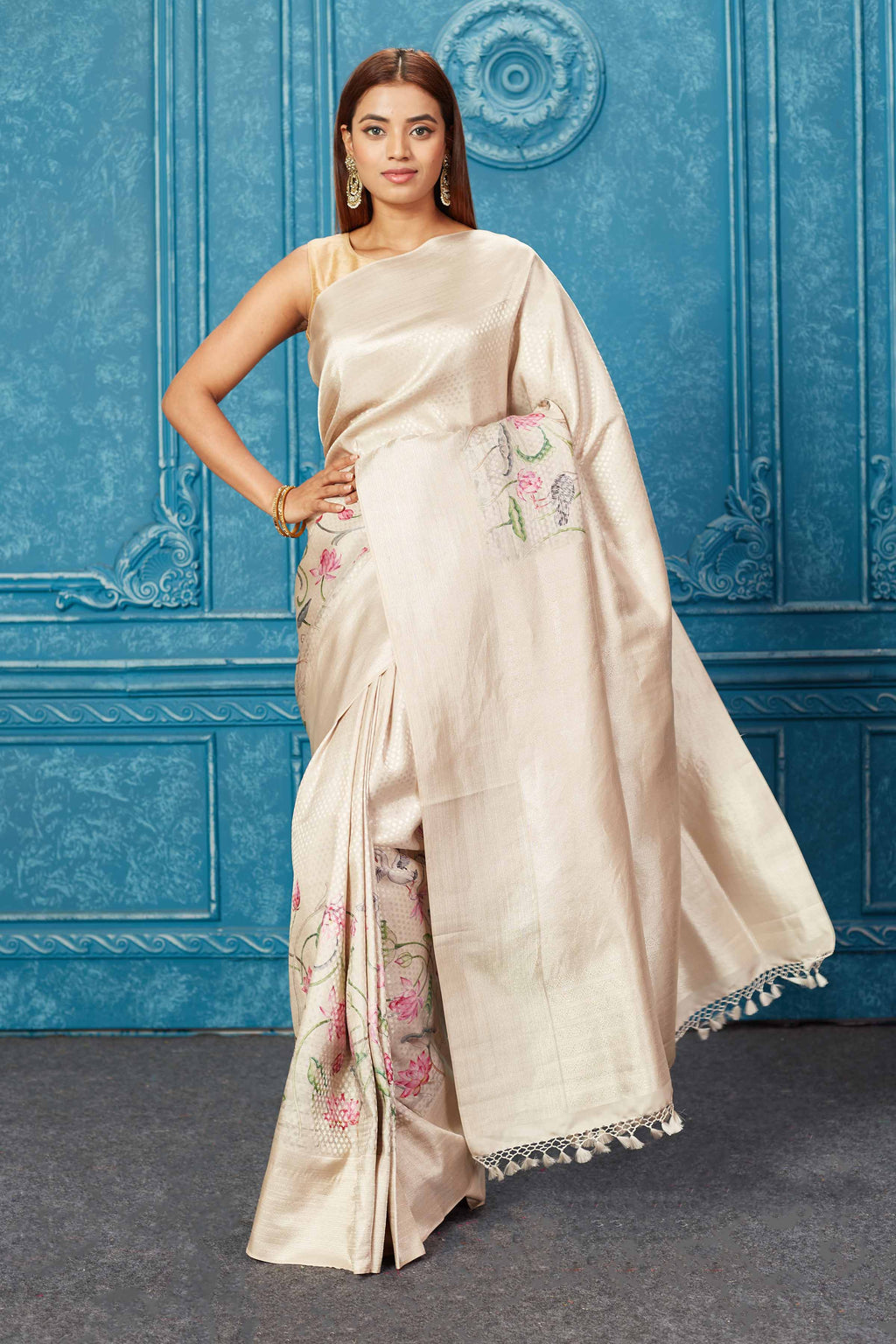 Shop stunning golden floral Kanjivaram silk saree online in USA . Keep your ethnic wardrobe up to date with latest designer sarees, pure silk sarees, Kanchipuram silk saris, handwoven sarees, tussar silk sarees, embroidered sarees from Pure Elegance Indian saree store in USA.-front