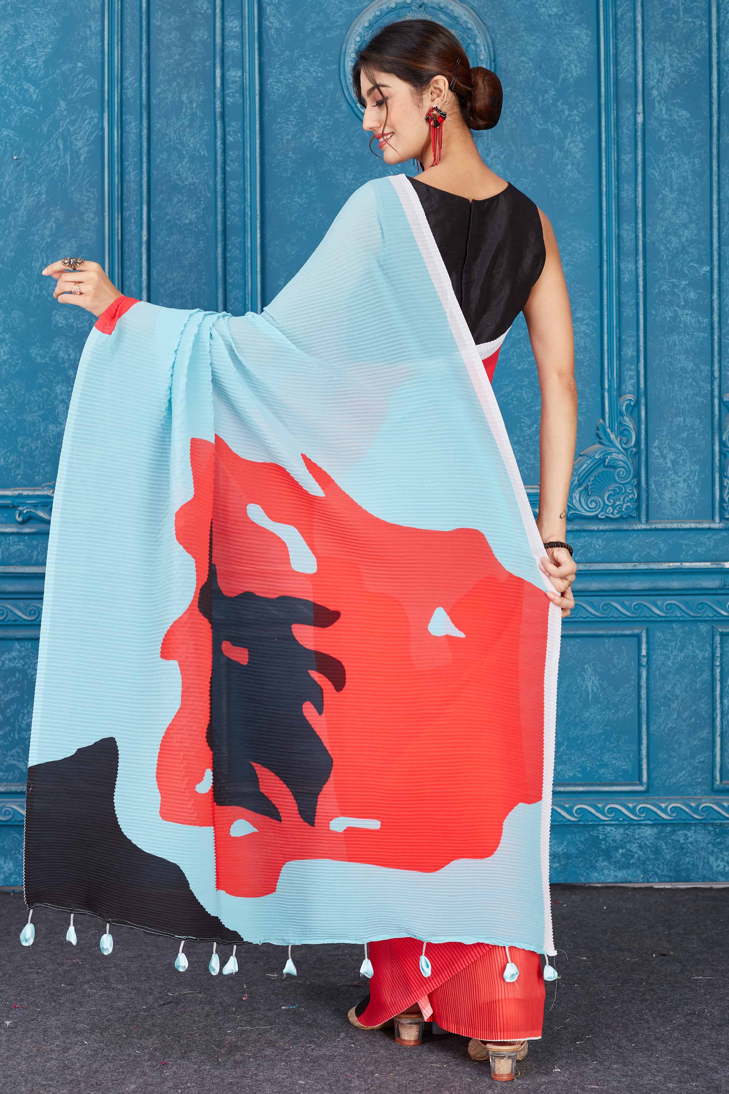 Buy red and powder blue abstract print crushed georgette saree online in USA. Look your best on festive occasions in latest designer sarees, pure silk saris, Kanchipuram silk sarees, handwoven sarees, tussar silk sarees, embroidered saris from Pure Elegance Indian clothing store in USA.-back