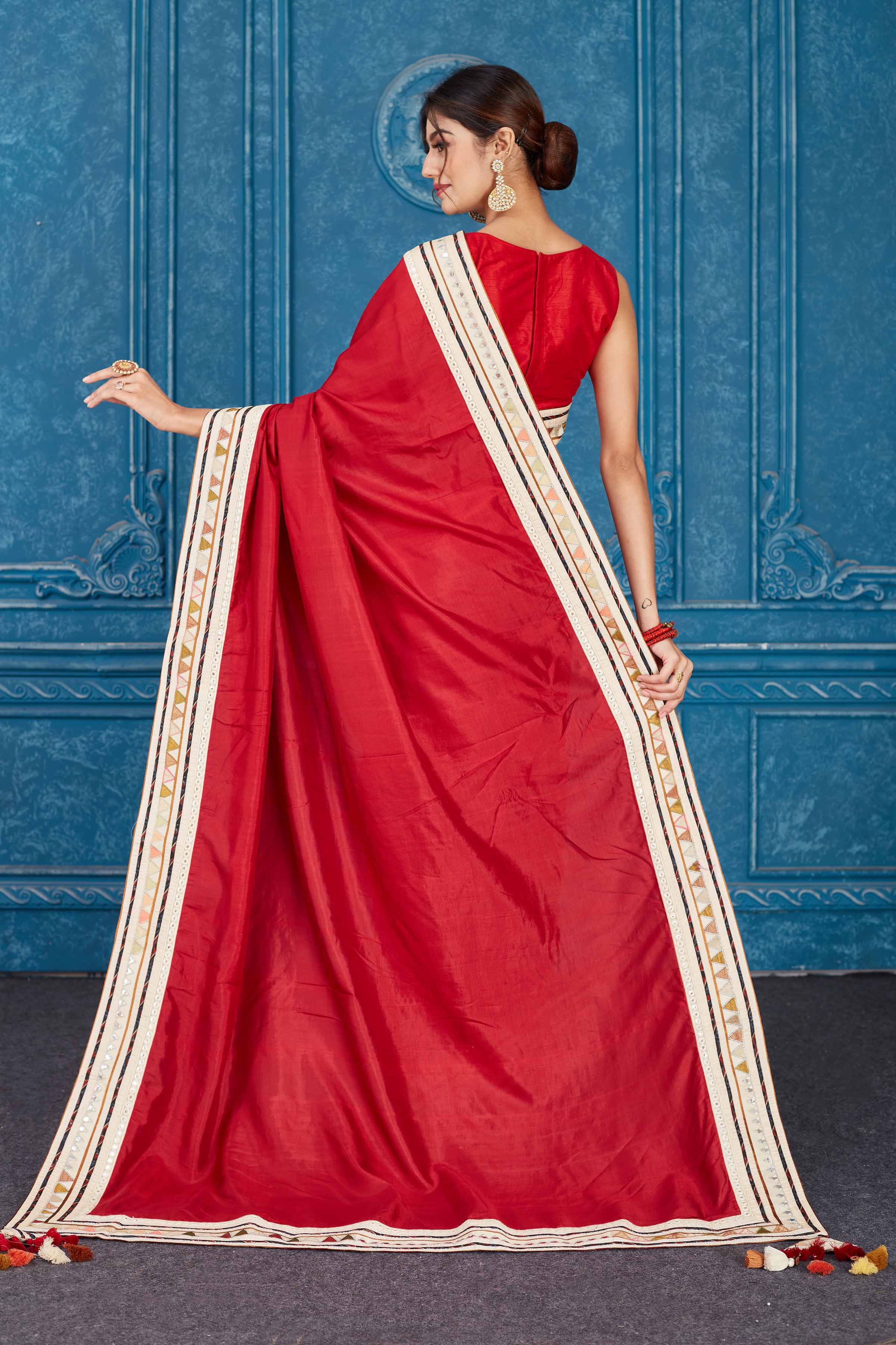 Shop beautiful blood red chanderi silk saree online in USA with patch mirror work border. Look your best on festive occasions in latest designer sarees, pure silk saris, Kanchipuram silk sarees, handwoven sarees, tussar silk sarees, embroidered saris from Pure Elegance Indian clothing store in USA.-back