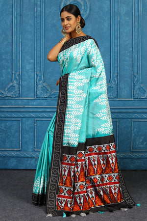 Buy sky blue pochampally silk ikkat sari online in USA with black border. Look your best on festive occasions in latest designer sarees, pure silk sarees, Kanchipuram sarees, handwoven sarees, tussar silk sarees, embroidered sarees from Pure Elegance Indian clothing store in USA.-pallu