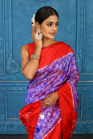 Buy purple pochampally silk ikkat saree online in USA with red border. Look your best on festive occasions in latest designer sarees, pure silk sarees, Kanchipuram sarees, handwoven sarees, tussar silk sarees, embroidered sarees from Pure Elegance Indian clothing store in USA.-closeup