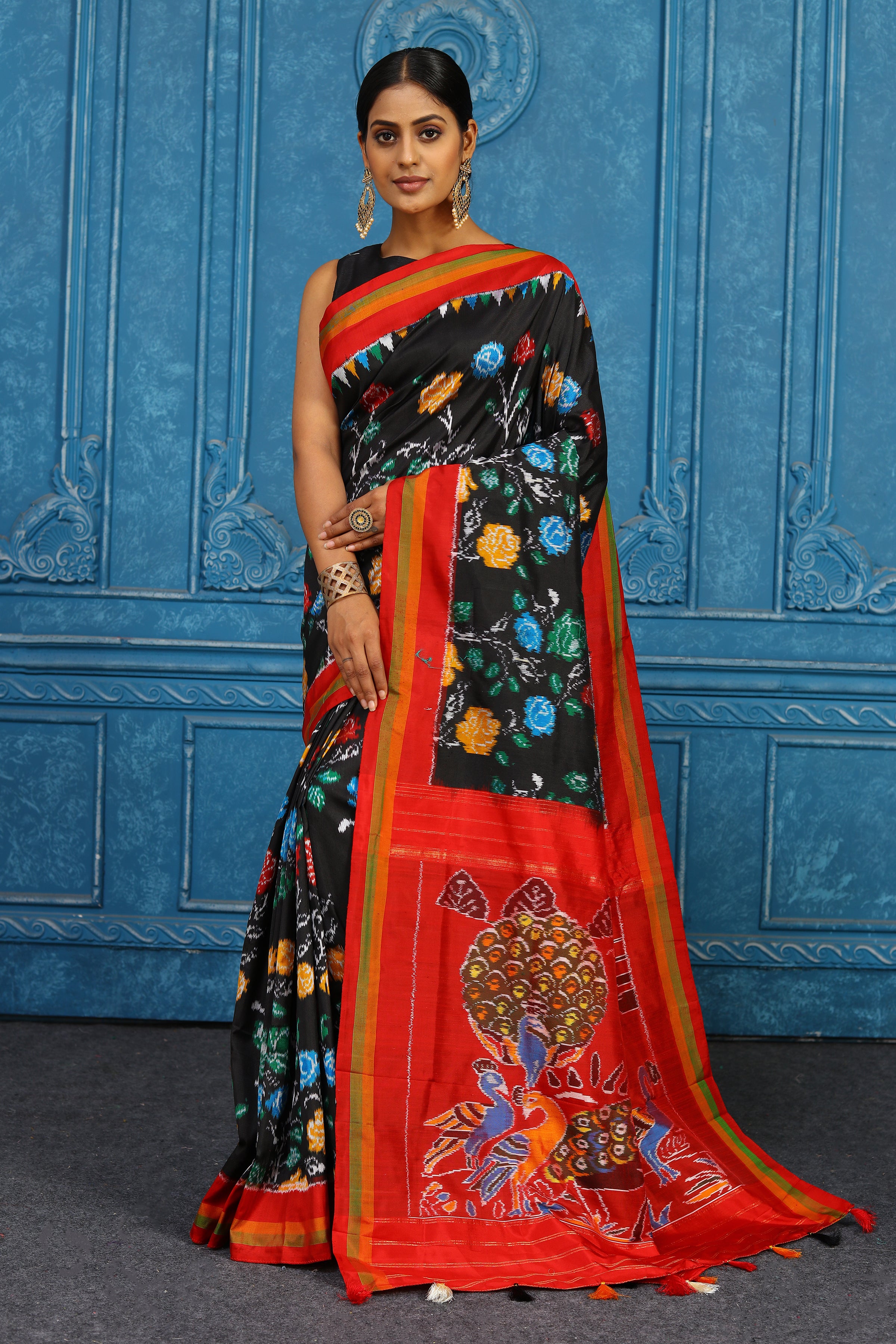 Shop black pochampally ikkat sari online in USA with red border. Look your best on festive occasions in latest designer sarees, pure silk sarees, Kanchipuram sarees, handwoven sarees, tussar silk sarees, embroidered sarees from Pure Elegance Indian clothing store in USA.-full view
