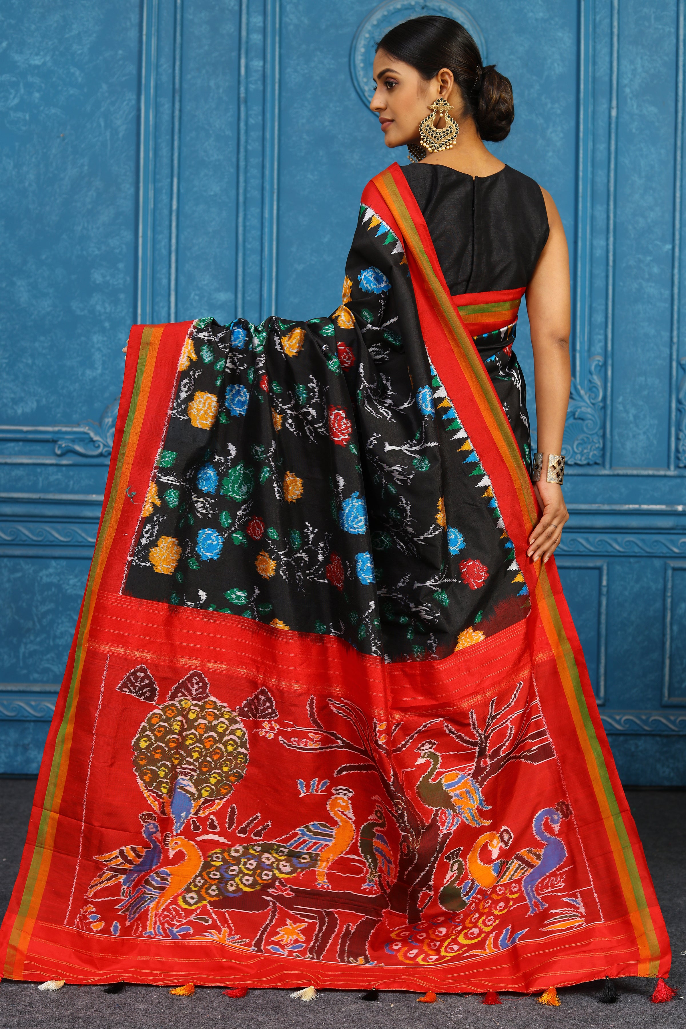 Shop black pochampally ikkat sari online in USA with red border. Look your best on festive occasions in latest designer sarees, pure silk sarees, Kanchipuram sarees, handwoven sarees, tussar silk sarees, embroidered sarees from Pure Elegance Indian clothing store in USA.-back