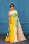 Shop pista green Gadhwal silk saree online in USA with peach yellow border. Level up your ethnic style in latest designer saris, pure silk saris, Kanchipuram silk saris, handwoven sarees, tussar silk sarees, embroidered saris from Pure Elegance Indian clothing store in USA.-full view