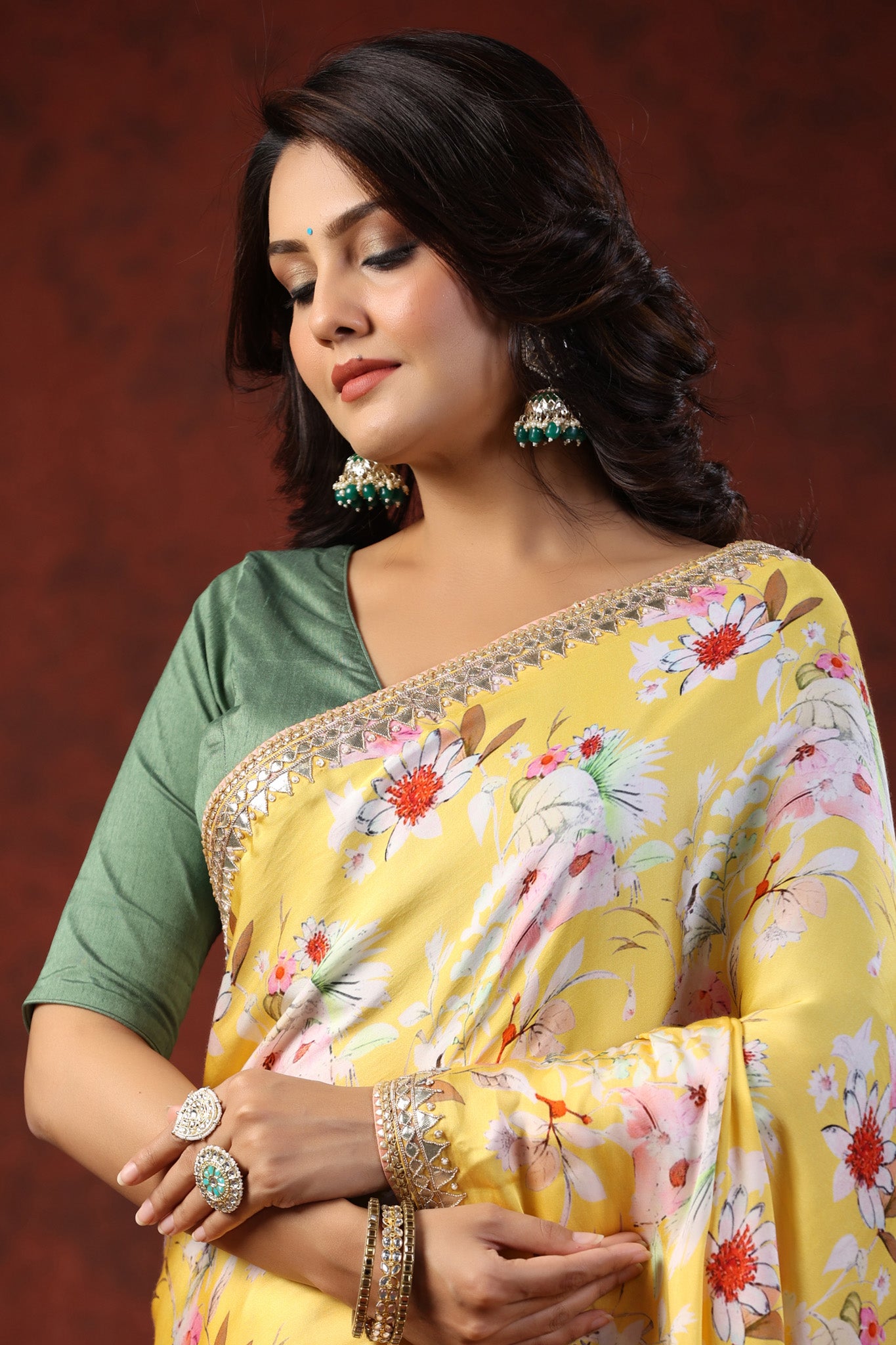 Shop yellow floral print crepe sari online in USA with embroidered border. Make a fashion statement on festive occasions and weddings with designer suits, Indian dresses, Anarkali suits, palazzo suits, designer sarees, sharara suits, Bollywood saris from Pure Elegance Indian fashion store in USA.-closeup