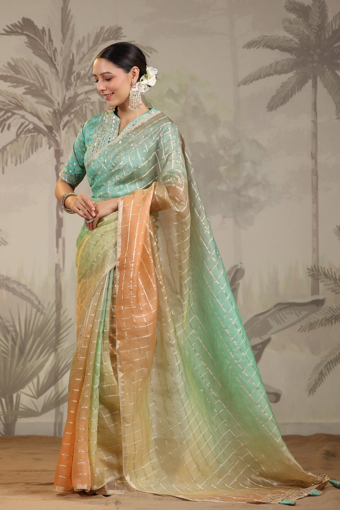 Buy peach and green embroidered tissue silk saree online in USA with embroidered blouse. Make a fashion statement on festive occasions and weddings with designer suits, Indian dresses, Anarkali suits, palazzo suits, designer sarees, sharara suits, Bollywood saris from Pure Elegance Indian fashion store in USA.-pallu