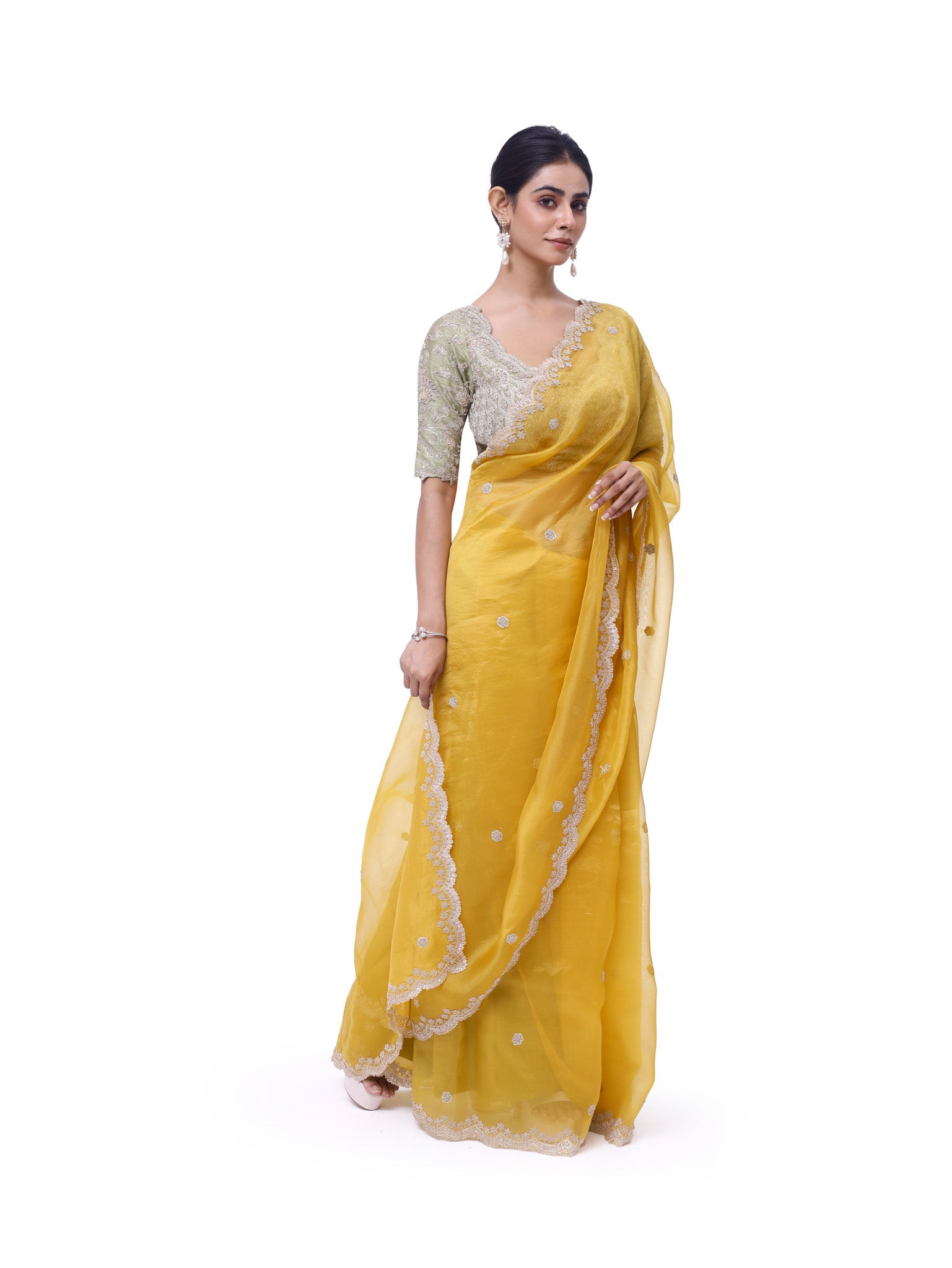 Buy yellow embroidered organza saree online in USA with green embroidered blouse. Look like a royalty in exquisite designer sarees, embroidered sarees, handwoven sarees, pure silk saris, Banarasi sarees, Kanjivaram sarees from Pure Elegance Indian saree store in USA.-side
