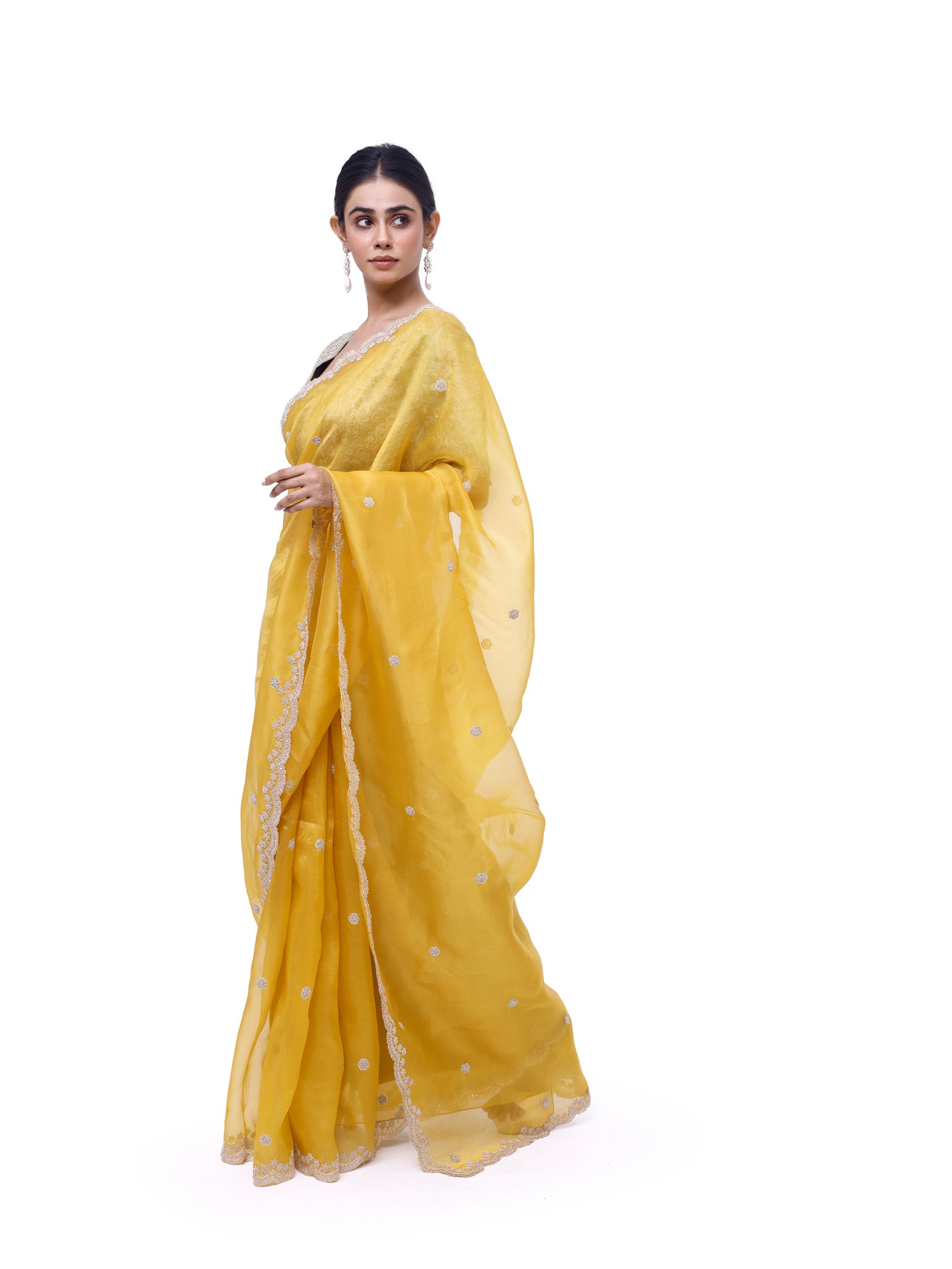 Buy yellow embroidered organza saree online in USA with green embroidered blouse. Look like a royalty in exquisite designer sarees, embroidered sarees, handwoven sarees, pure silk saris, Banarasi sarees, Kanjivaram sarees from Pure Elegance Indian saree store in USA.-pallu