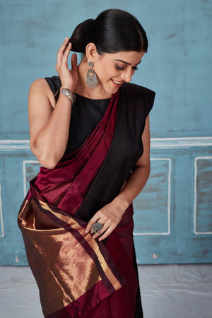 Buy magenta Pattu silk saree online in USA with black Mashru border. Look your best on festive occasions in latest designer saris, pure silk saris, Kanchipuram silk sarees, handwoven sarees, tussar silk sarees, embroidered sarees from Pure Elegance Indian fashion store in USA.-closeup
