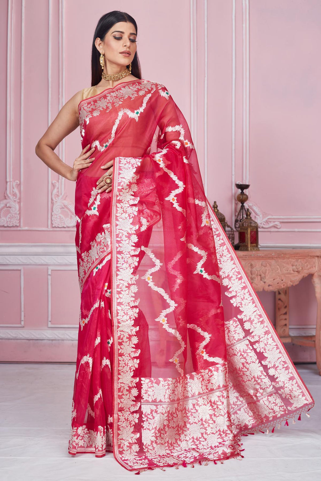 Shop beautiful red Banarasi saree online in USA with floral zari border. Look your best on festive occasions in latest designer saris, pure silk sarees, Kanjivaram silk sarees, handwoven saris, tussar silk sarees, embroidered saris from Pure Elegance Indian fashion store in USA.-full view