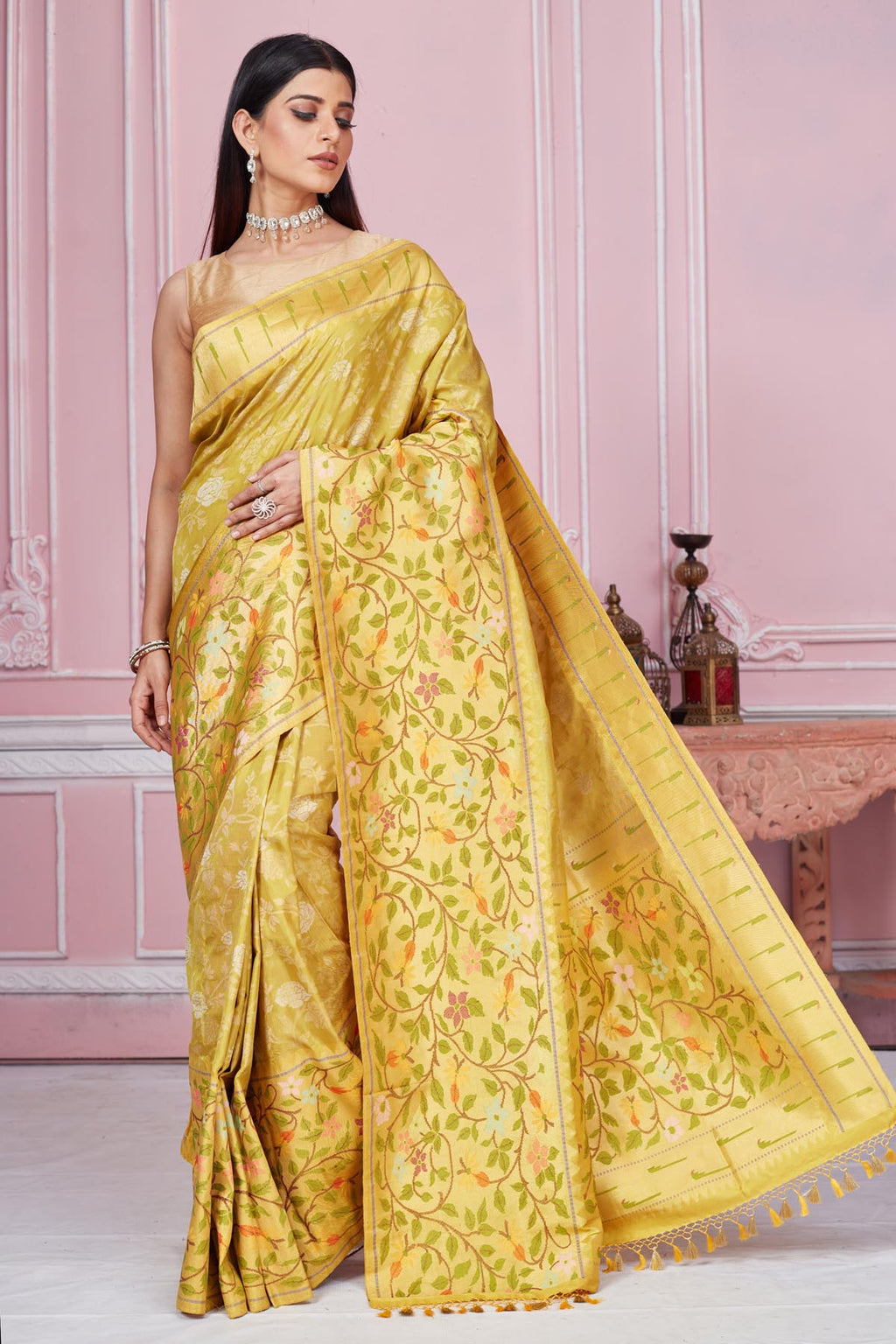 Buy yellow Banarasi saree online in USA with heavy zari minakari border. Look your best on festive occasions in latest designer saris, pure silk sarees, Kanjivaram silk sarees, handwoven saris, tussar silk sarees, embroidered saris from Pure Elegance Indian fashion store in USA.-full view