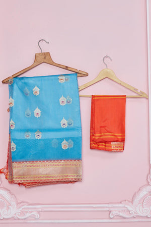 Buy light blue Banarasi sari online in USA with red zari border. Look your best on festive occasions in latest designer saris, pure silk sarees, Kanjivaram silk sarees, handwoven saris, tussar silk sarees, embroidered saris from Pure Elegance Indian fashion store in USA.-blouse