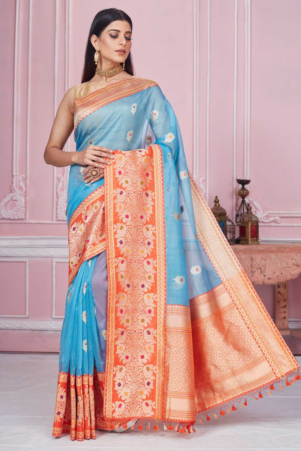Buy light blue Banarasi sari online in USA with red zari border. Look your best on festive occasions in latest designer saris, pure silk sarees, Kanjivaram silk sarees, handwoven saris, tussar silk sarees, embroidered saris from Pure Elegance Indian fashion store in USA.-full view