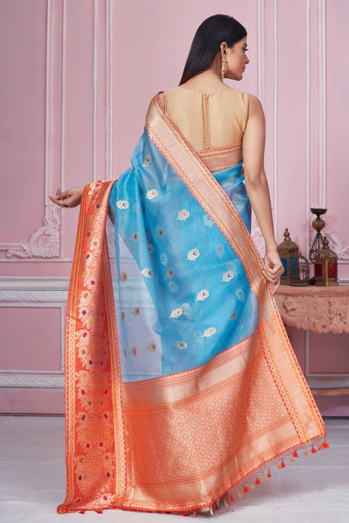 Buy light blue Banarasi sari online in USA with red zari border. Look your best on festive occasions in latest designer saris, pure silk sarees, Kanjivaram silk sarees, handwoven saris, tussar silk sarees, embroidered saris from Pure Elegance Indian fashion store in USA.-back