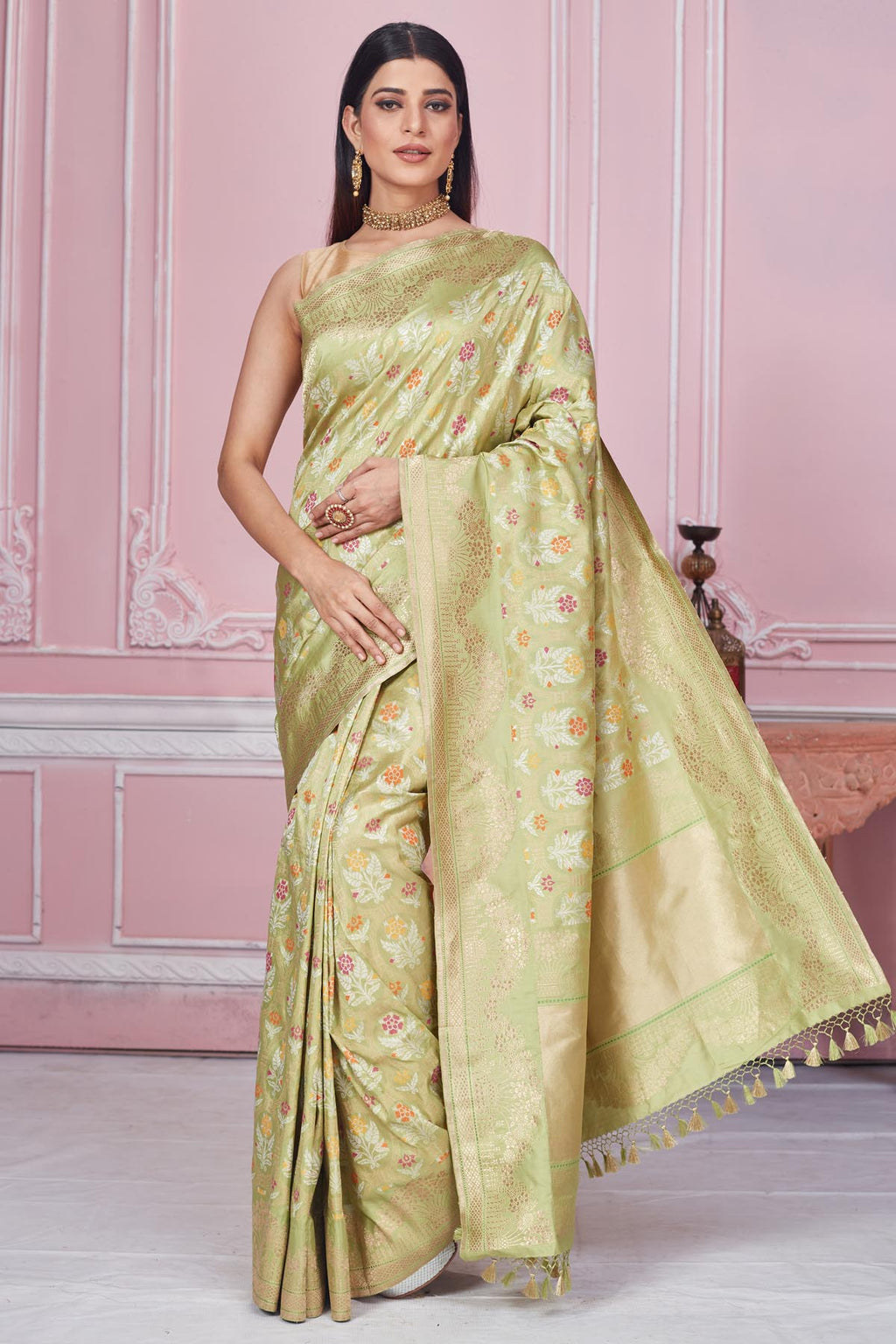 Buy pistachio green floral Minakari zari work Banarasi sari online in USA. Look your best on festive occasions in latest designer saris, pure silk sarees, Kanjivaram silk sarees, handwoven saris, tussar silk sarees, embroidered saris from Pure Elegance Indian fashion store in USA.-full view